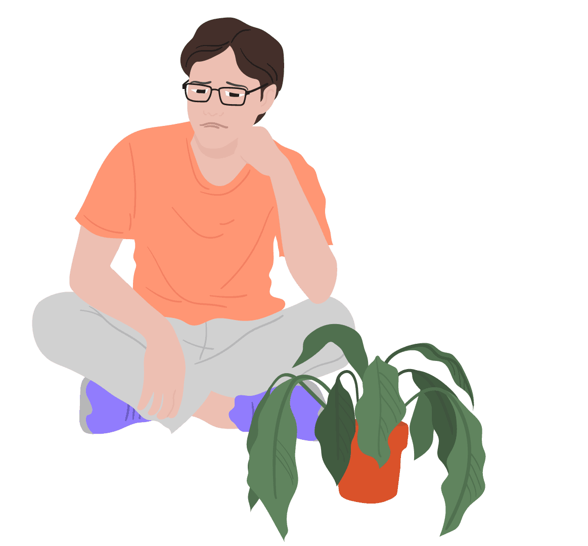 Man in a peach shirt holding a plant